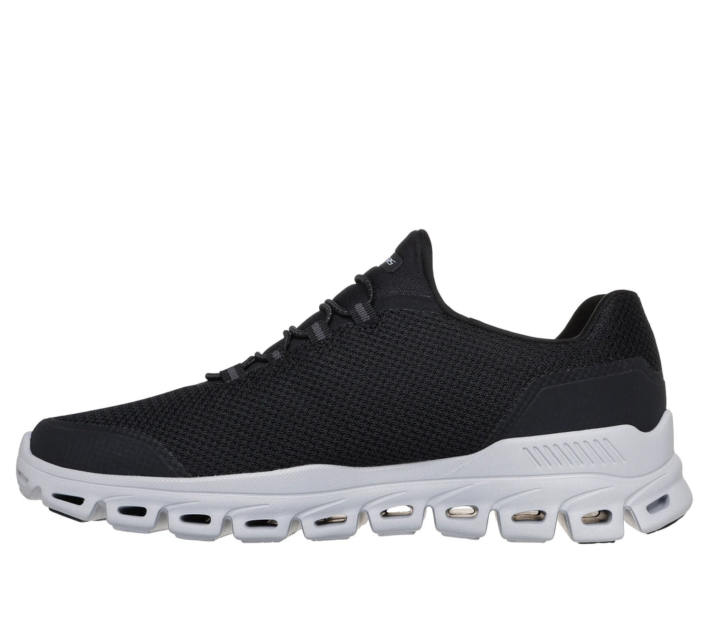 "Tenis Skechers negro con tecnología para caminar"