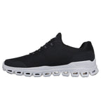"Tenis Skechers negro con tecnología para caminar"