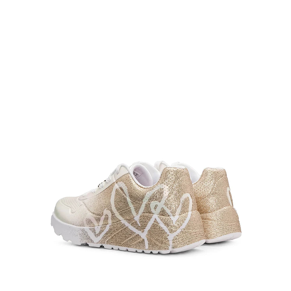 "Tenis Skechers niña blanco dorado corazones"